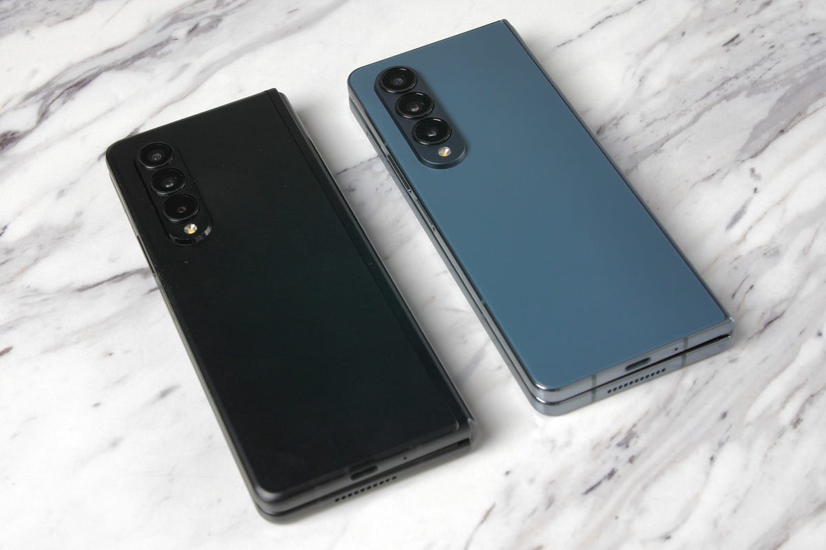 A Galaxy Z Fold 3 next to a Galaxy Z Fold 4